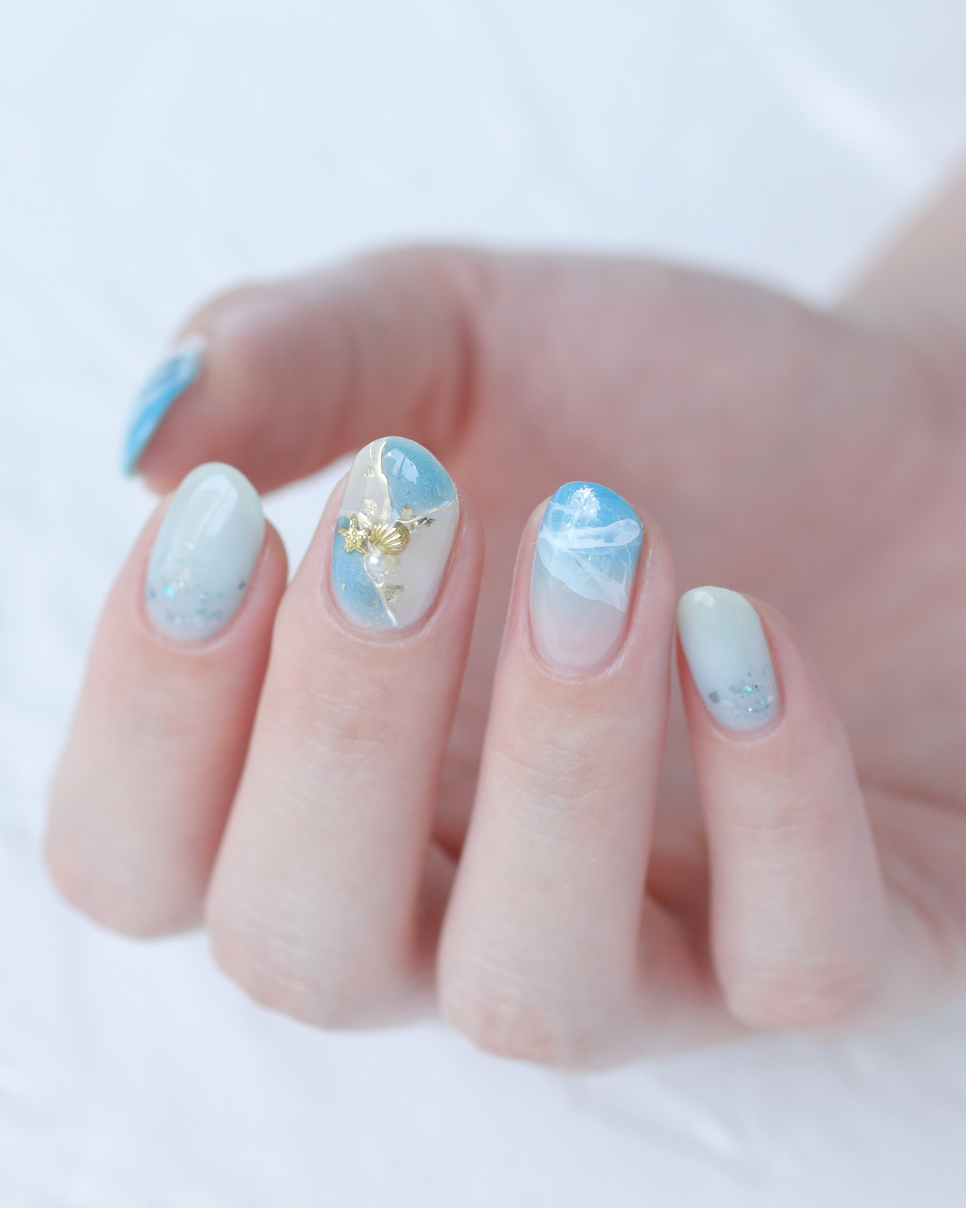 新百合ヶ丘パラジェル＆カルジェルネイルサロン「ネイルマーナ」夏ブルーネイル2025