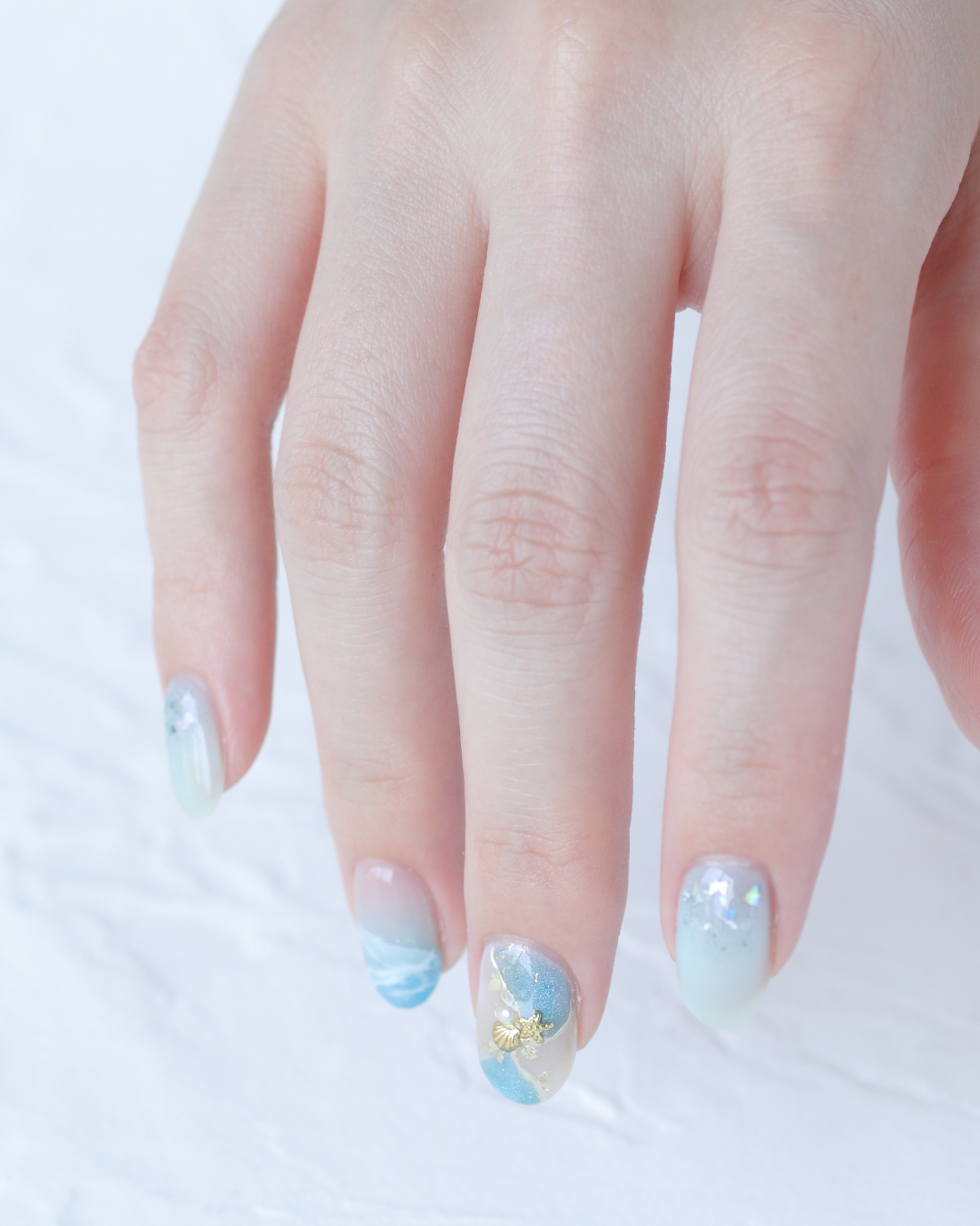 新百合ヶ丘パラジェル＆カルジェルネイルサロン「ネイルマーナ」夏ブルーネイル2025